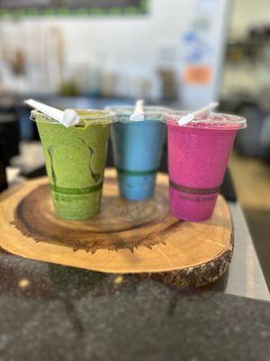 Green mango smoothie, blue coconut smoothie, & pitaya & pineapple smoothie.