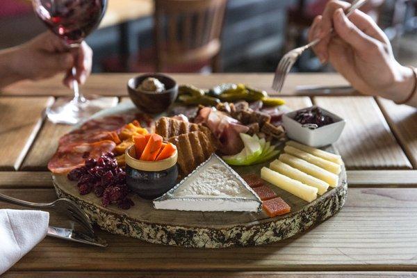 Deluxe cheese and charcuterie board.