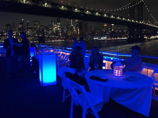 Guests sailing aboard Aqua Azul open rooftop deck.