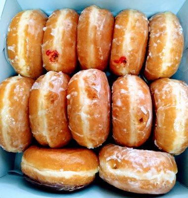 A dozen jelly donuts