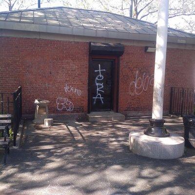 The women's room -in poor state- sewage leakage and now grafitti