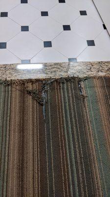 One section of ripped carpets