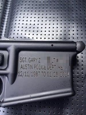 Photo of the mag-well receiver engraved by Gray Laser Engraving.  This was a retirement gift for my boss.