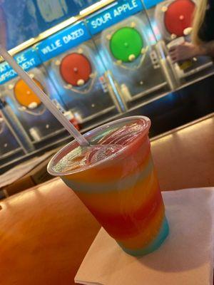 Alcoholic slushie mango, strawberry, blue razz