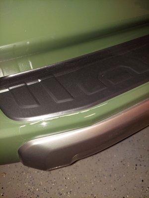 Back bumper luggage strip