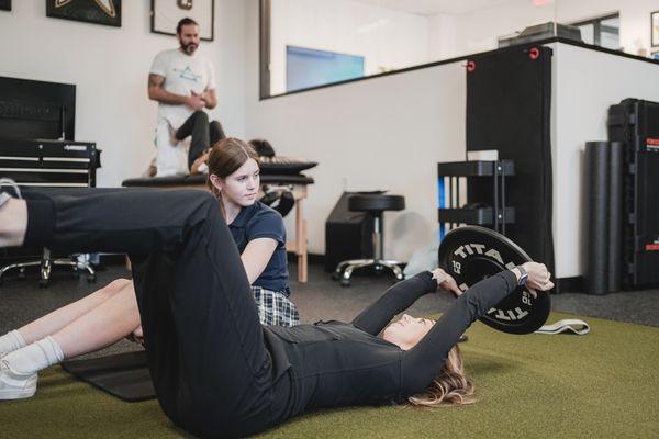 Dr. Lauren Mueller working with a client.