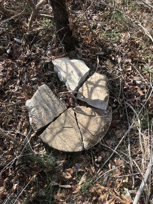 Old broken septic lid that Shelby Septic threw on homeowners property.