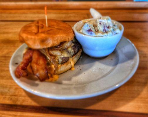 bacon cheeseburger made with their very own homemade cheese and potato salad