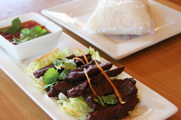 Beef Jerky appetizer with tangy tomato sauce and sticky rice