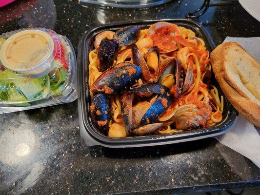 Seafood Pasta, Shrimp, Clams, Scallops & Mussels on Linguine & Fra Diavolo sauce /w side salad & garlic bread ....delicious!