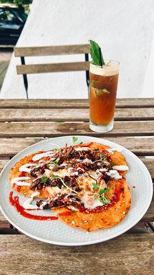 Summer drink called Bey and Oxtails Huevos Rancheros