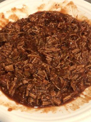 Bought a 1/2 pound of Carnitas, chopped it up, added bbq sauce and some salsa roja - Slap Yo Momma Good !!!