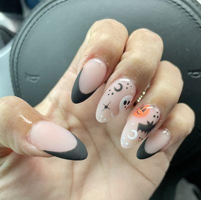 Entering spooky session with the cutest nails. By Julie