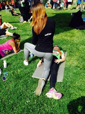 Hanging with the Muscle Milk Crew stretching and conditioning runners after their 10k run :)