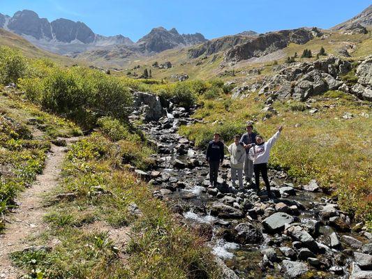 American Basin Waterfall and the group. Just an 1/8 mile up from the parking lot.