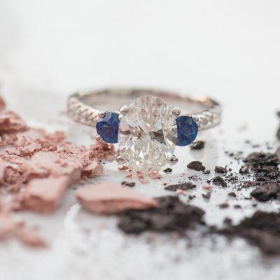 This gorgeous diamond and sapphire engagement ring is simple and stunning.