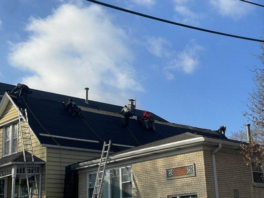 Installing shingles new roof