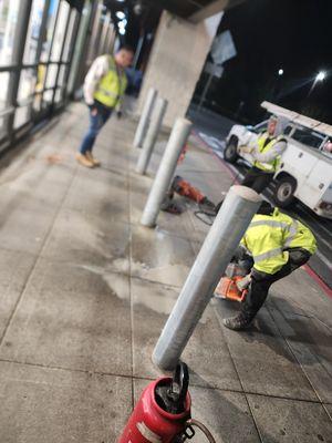 Cut , to start  demo concrete to remove  old bollars  and reposición the new ones