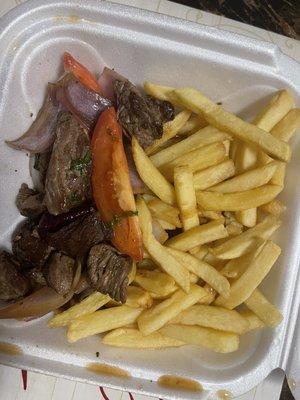 Lomo saltado with fries