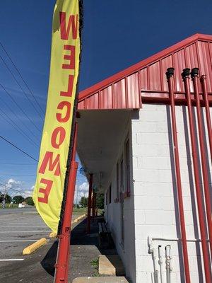 If you're heading West, look for the Welcome Flag out front! Taqueria Lolita-Most authentic Mexican food in the area!