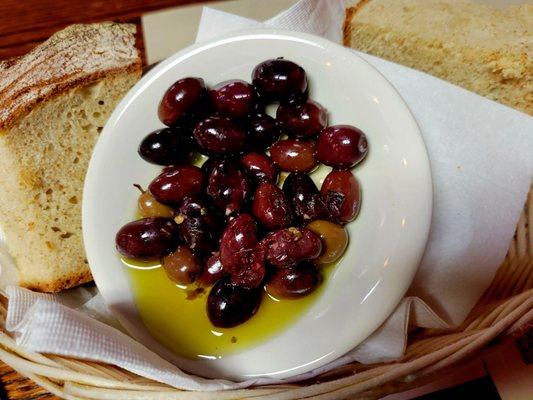 Complementary olives and bread