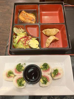 Bento box with teriyaki salmon, and Sushi ordered off the menu.