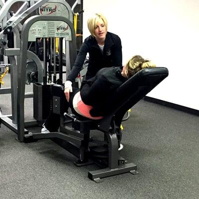 Courtney and her personal training client working on hip strength.