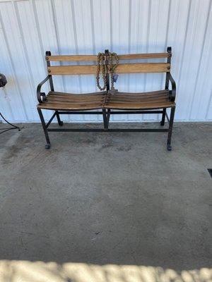 A sweet rustic bench- reminds me of a school chair.