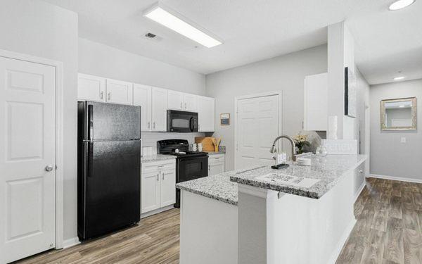 Spacious kitchen with breakfast bar.