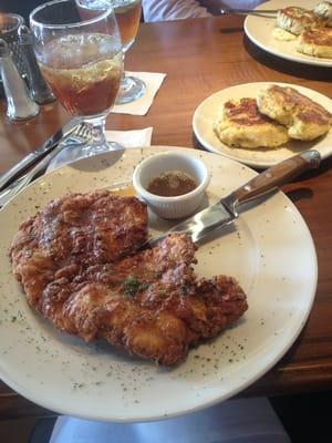 Pecan crusted chicken with maple Dijon dressing, country Porto cakes as a side, and a sweet tea (: