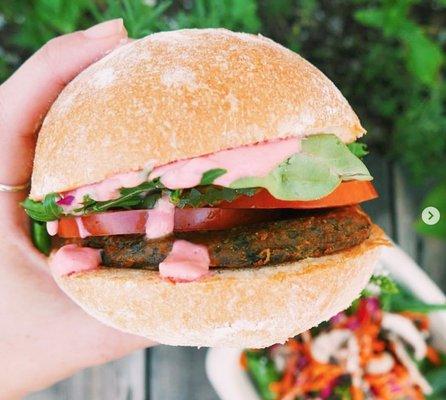 Mother Trucker Vegan Burger!  Soy-free house-made veggie patty + beet ketchup + mixed greens + tomato + pickle + locally baked ciabatta