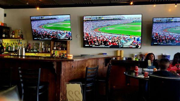 The bar and the sports...you can even watch dining al fresco.