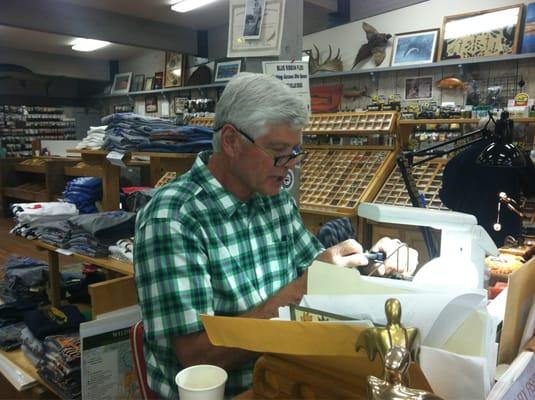 Craig Mathews at his tying bench in Blue Ribbon Flies.