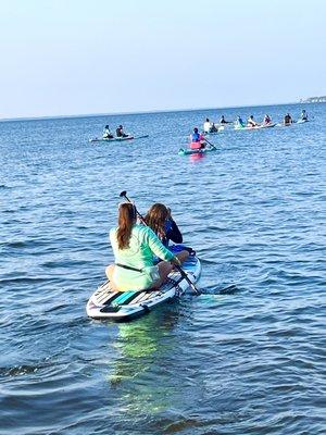 A large group Sunset Tour sets off on Choctawatchee Bay.