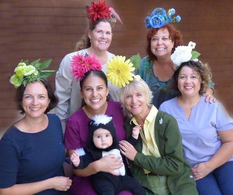 There's a skunk in our garden! Clockwise from top left: Kathy, Sophie, Jessica, Dr. Roni, Emily, Elena, and baby Brielle! Halloween 2018