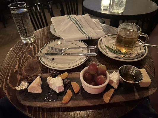 The cheese plate was delightful. Hot slices of pita are under the napkin. Peppermint tea was my drink of choice tonight.