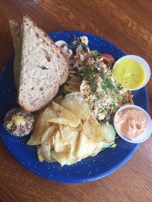 Tuna salad sandwich with side of go nuts salad