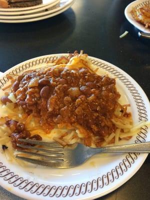 Hashbrowns with cheese, onions, and chili