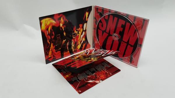 CD in 4 panel digipak with pocket and insert