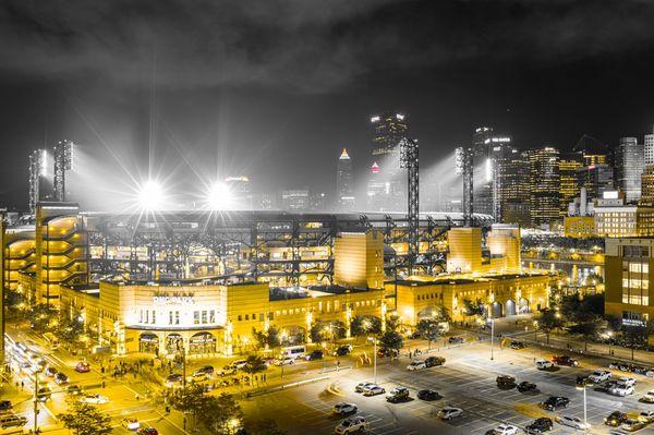 PNC Park adorned in Black and Gold with Oittsburgb Skyline