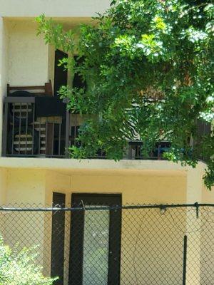 Just lovely, why doesn't everybody keep tires and carpets hanging from their balconies?