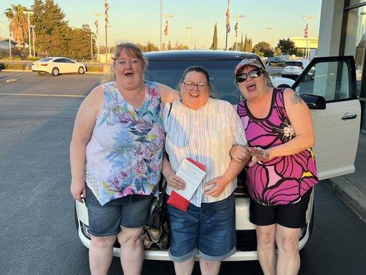 Christina, Bonnie and Liz. In front of the new family vehicle! An awesome Ford Flex!! Antioch Chrysler Jeep Dodge