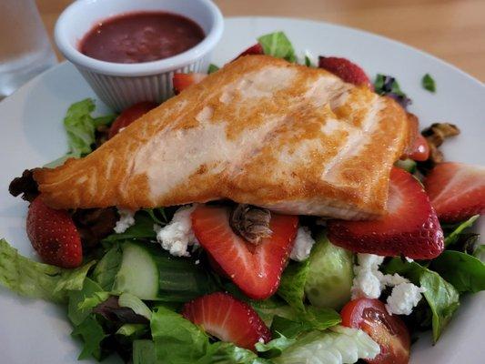 The Watermark salad (strawberries,  goat cheese, candied walnuts, cucumber& tomato). I added salmon.  It was delicious