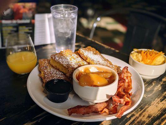 Brioche french toast,bacon, cheesey grits, bacon and a mimosa. Not a bad bite anywhere.