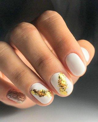 Gel Manicure with warm gold glitter and foil design