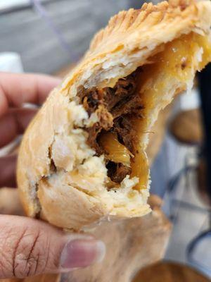 Chicken adobo empanada