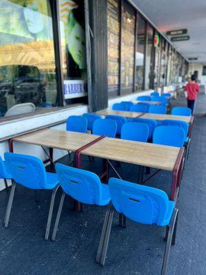 Outdoor seating area. Small tables and chairs just like Vietnam.