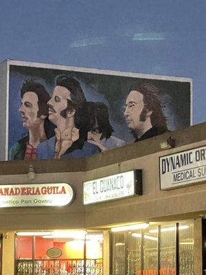 Humongous Beatles Mural  on the back of Derby Apts in the  strip mall near Marlon Brando Wall Mural Santa Monica & Wilton in Hollywood