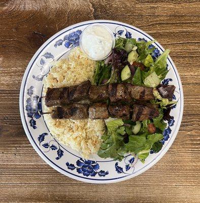 Beef Kabobs Plate - 2 beef skewers served with rice, salad, & tzatziki & pita