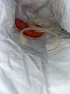 Had to take out onion and tomato after I asked for no onion and tomato